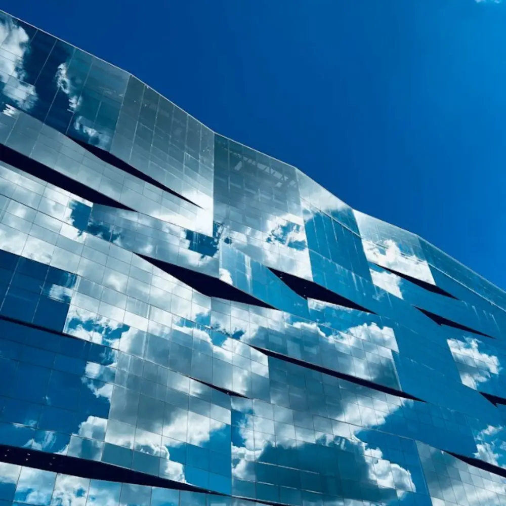 Mirrored Building Reflecting Clouds